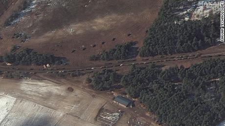 In Berestyanka - 10 miles west of the air base - a number of fuel trucks were seen and what Maxar says were apparently multiple rocket launchers positioned in a field near the trees.