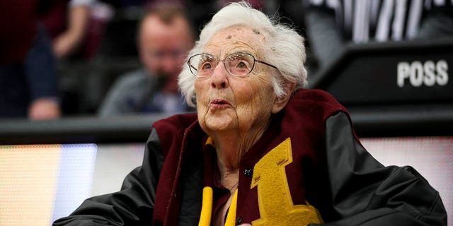 Sister Jane Dolores Schmidt celebrates her 100th birthday on August 21, 2019. Sister Jane is surprised after taking the fourth NCAA ring before the Loyola Ramblers play with the Nevada Wolf Pack in 2018 at the Gentile Arena in Chicago, Illinois.