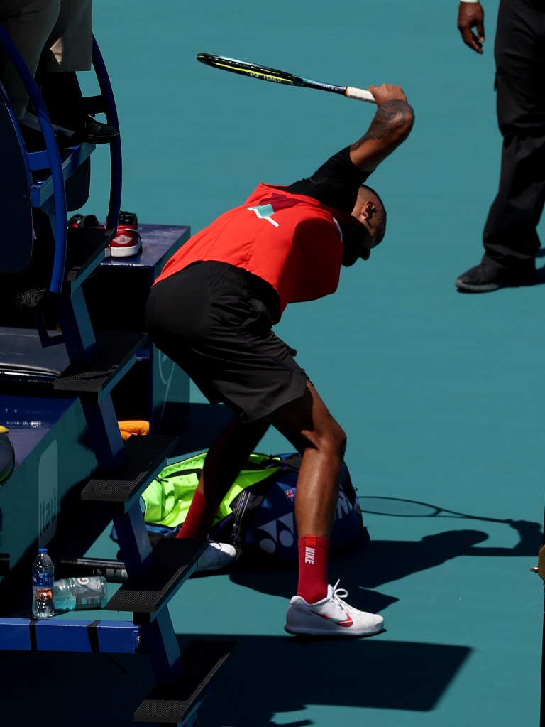 Nick Kyrgios smashes his racket at the Miami Open on March 29, 2022.