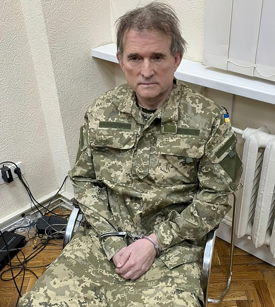 In this photo provided by the Ukrainian Presidential Press Office, oligarch Viktor Medvedchuk, the former leader of a pro-Russian opposition party and close associate of Russian leader Vladimir Putin, sits in handcuffs after his arrest in a special operation carried out by the country's secret intelligence service, Tuesday, April 12, 2022, in Ukraine.