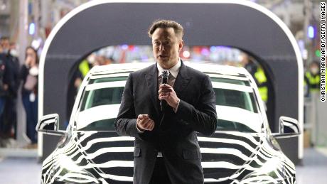 Tesla CEO Elon Musk speaks during the official opening of Tesla's new electric vehicle manufacturing plant on March 22, 2022 near Gruenheide, Germany. 