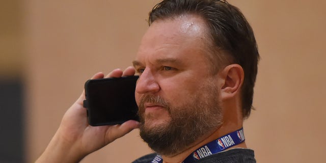 Daryl Morey, general manager of the Houston Rockets, speaks on the phone during training as part of the NBA Restart 2020 on July 23, 2020 in Orlando, Florida.