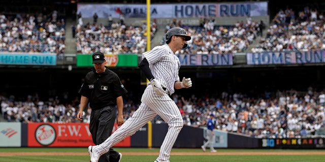 Kyle Higashioka spins third base after taking a home shot against the Chicago Cubs during the third inning at Yankee Stadium on June 12, 2022 in New York City.