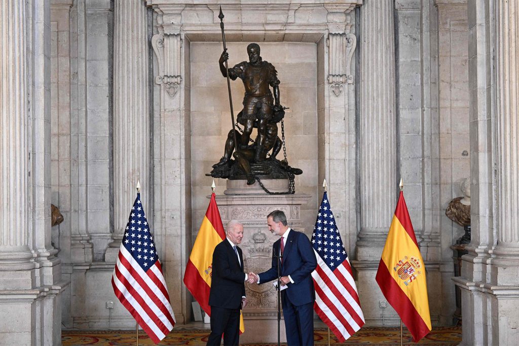 Spain's King Felipe VI receives President Joe Biden at the Royal Palace in Madrid, Spain.