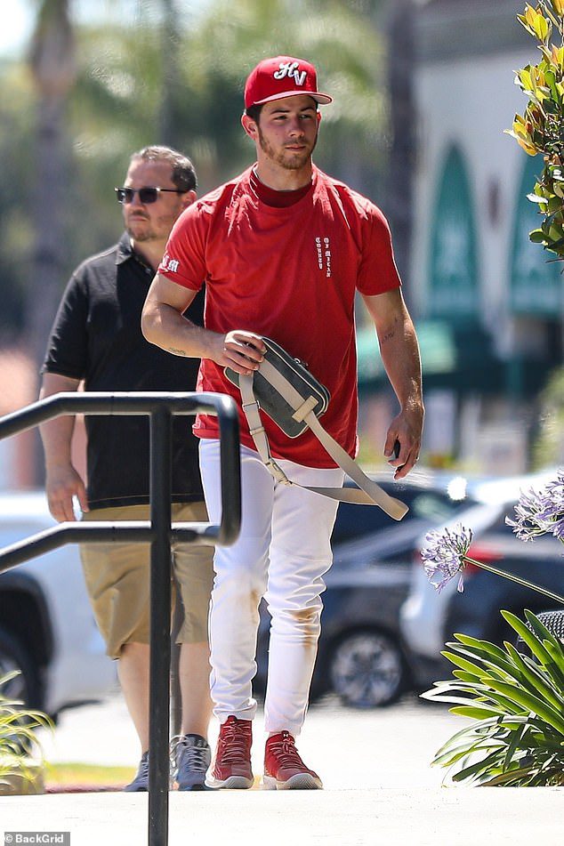 After practice: After arriving in Los Angeles after a golf tournament, Nick Jonas is seen having a softball practice
