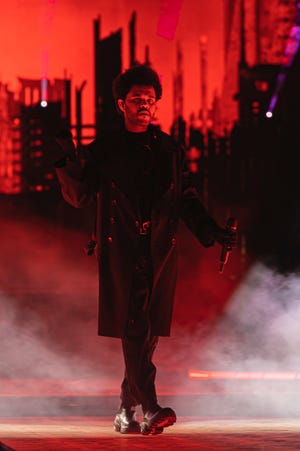 The Weeknd heads out onto the runway for the kick-off of his Philadelphia tour on Thursday.