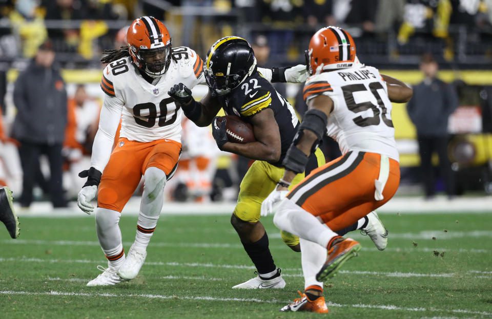 January 3, 2022;  Pittsburgh, Pennsylvania, USA;  Pittsburgh Steelers running back Nagy Harris (22) runs the ball against Cleveland Browns defensive end Jadevion Clooney (90) and linebacker Jacob Phillips (50) during the second quarter at Heinz Field.  Mandatory credit: Charles LeClaire-USA TODAY Sports Amazon Prime