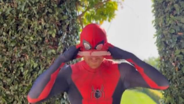 Dressed in a Spider-Man suit, Prince Harry does not reveal his face or identity, in the funny but heartwarming video to wish children a Merry Christmas.