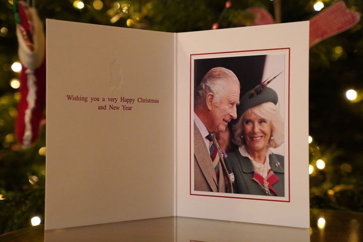 Christmas card for the year 2022 of King Charles III and the Queen Consort in front of the Christmas tree at Clarence House.  Samir Hussein captured the card photo at the Premar Games on Sept. 3. 